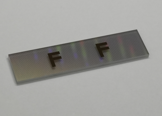 Black and white diffractive gratings -